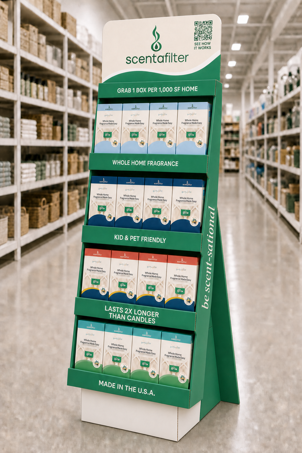 The scentafilter floor display in brand green, its header reading grab 1 box per 1,000 sf home, stocked with boxes in individual scent colors